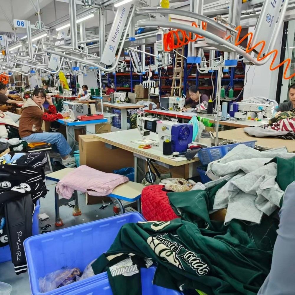 custom apparel sewing workshop oem manufacturer b2b production