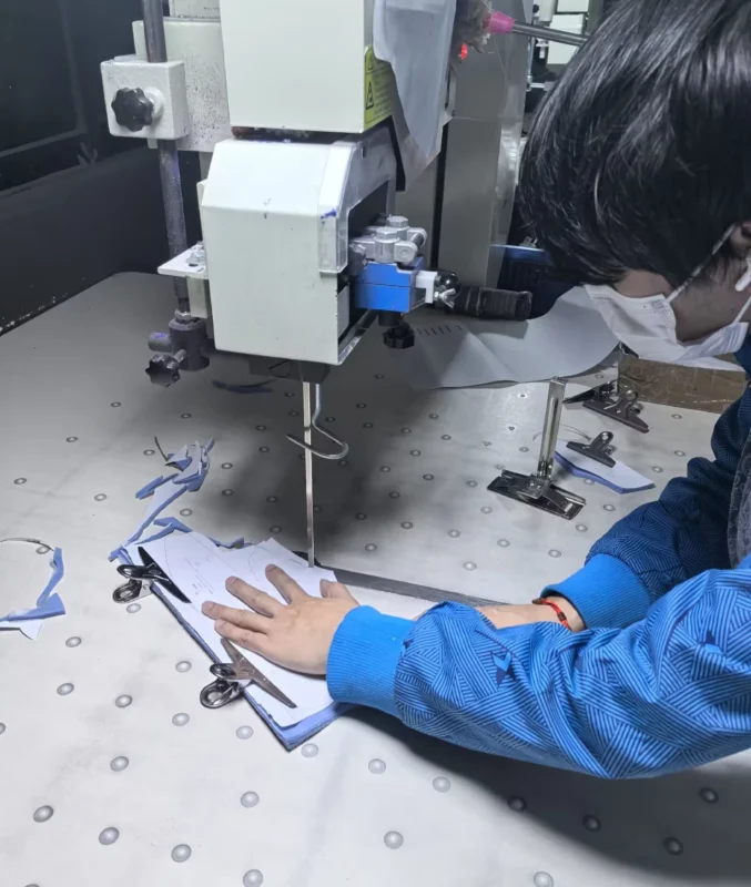 Leather jacket customization process with quality control inspection.